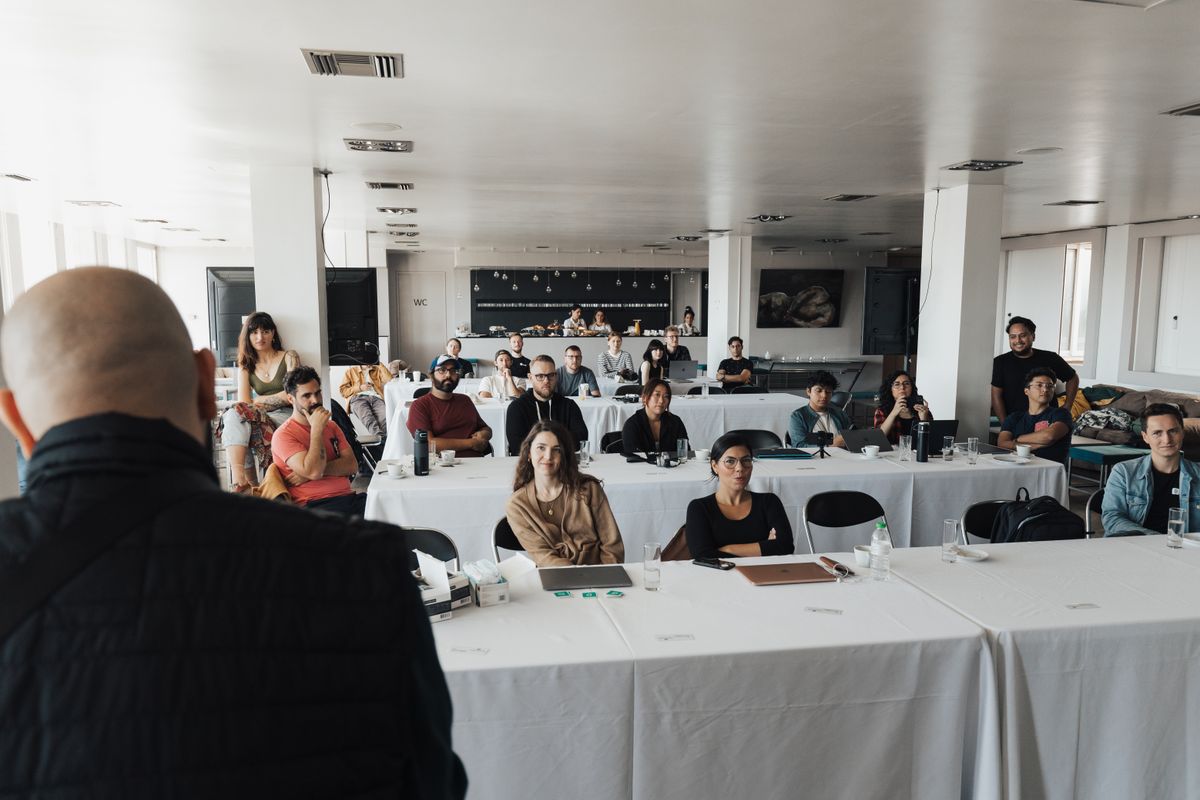 A facilitator leading a training workshop with a small nonprofit team