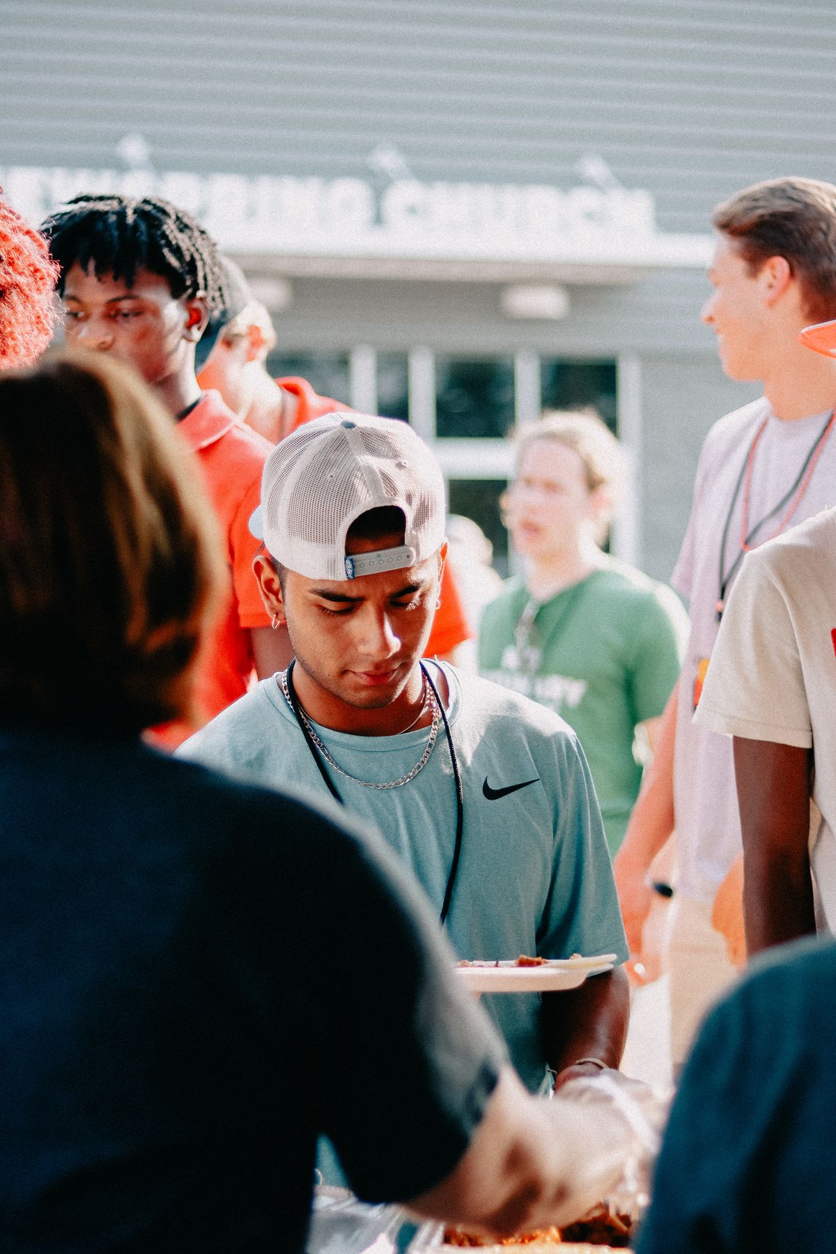 Community members serving one another at a church fellowship meal